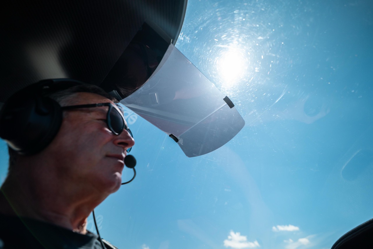 The Q Sun Visor deflecting a direct sun flare inside the Bristell canopy